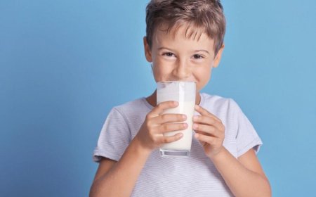 How much milk should children drink depending on their age?